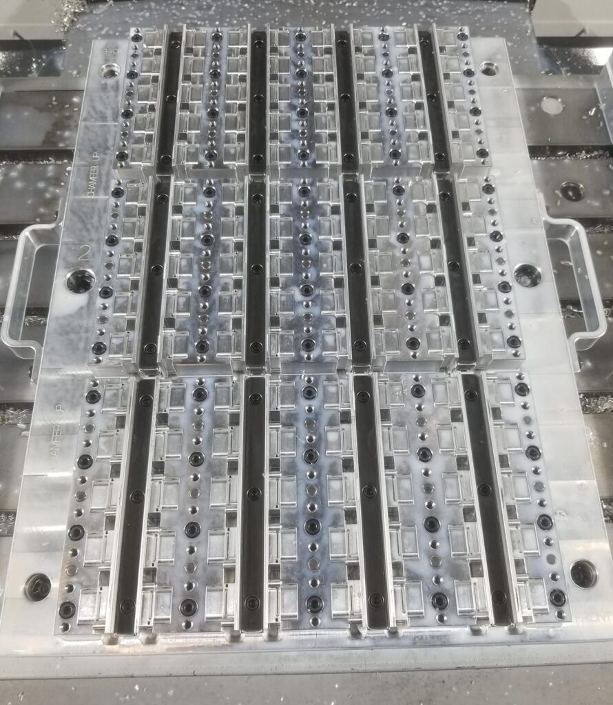 Mitee-Bite high-density fixture on CNC bed